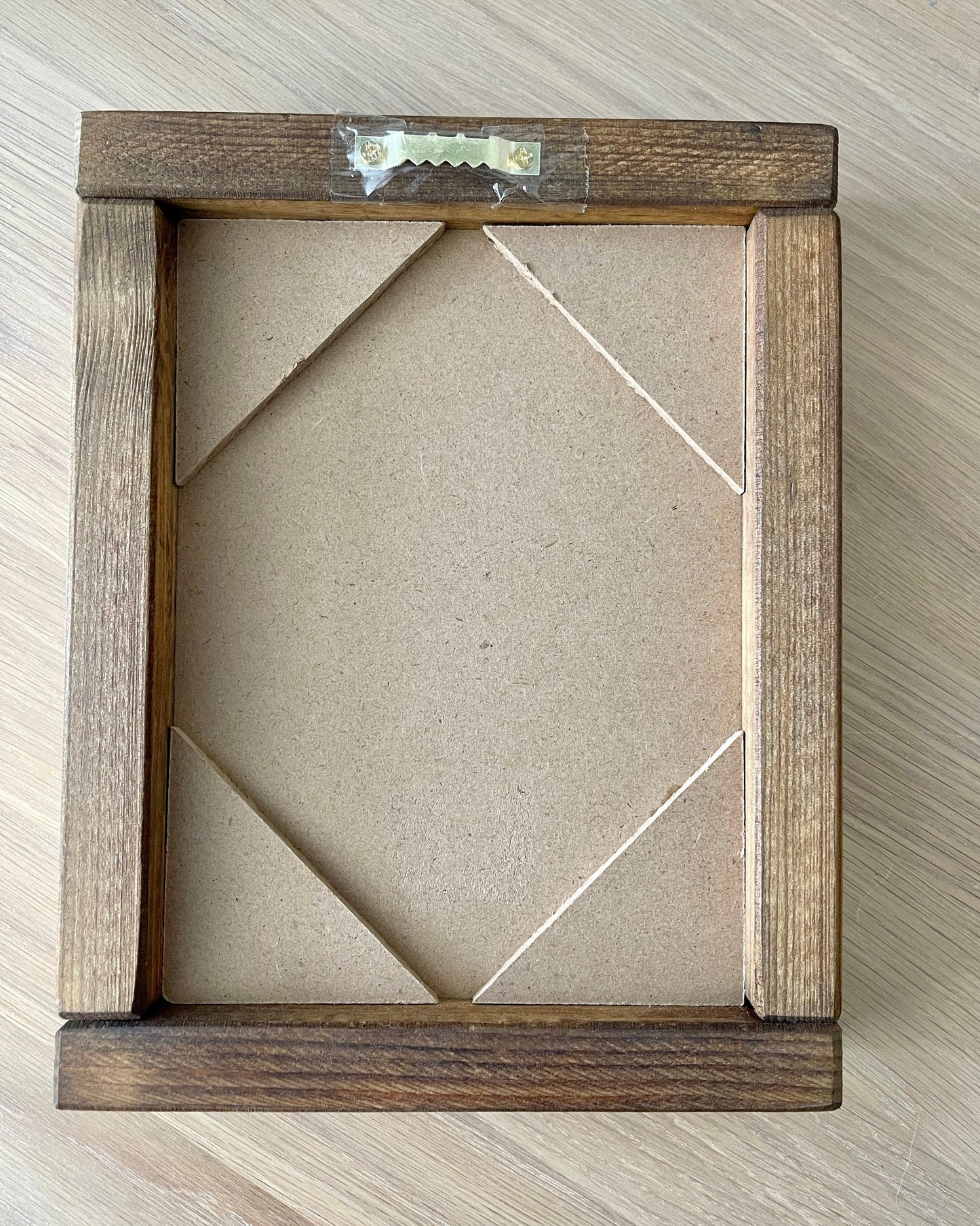 The Snug Wooden Sign.