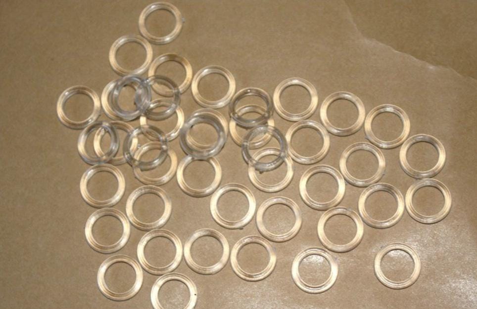 13mm clear sew on roman blind cord rings. Various packs available
