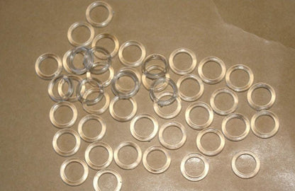 13mm clear sew on roman blind cord rings. Various packs available